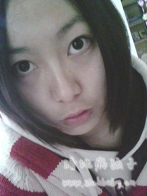 这是刚刚把头发剪掉的小北。。